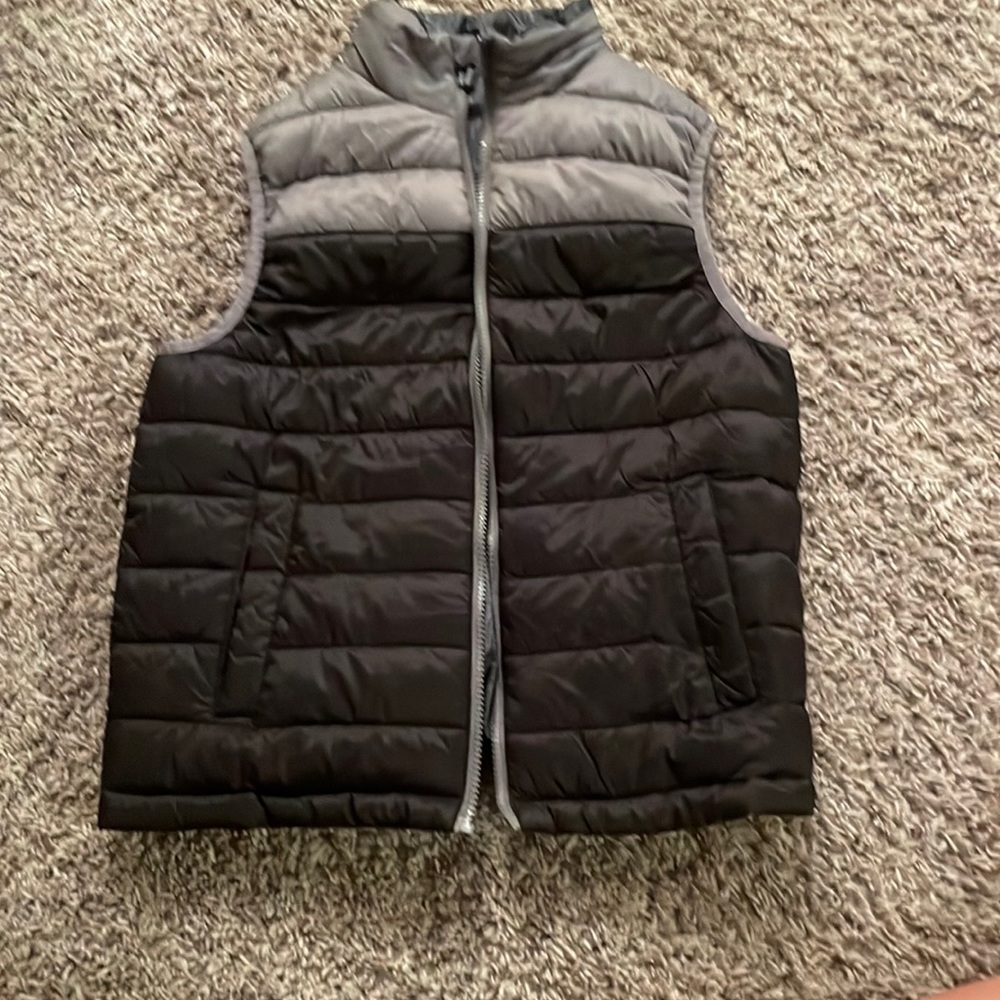 Youth size 10/12 reversible puffer vest